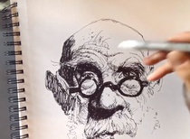 Thomas Fluharty drawing with Pen and Ink